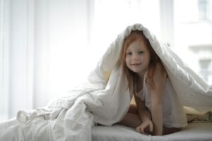 Weighted blanket on a child's bed for sensory support