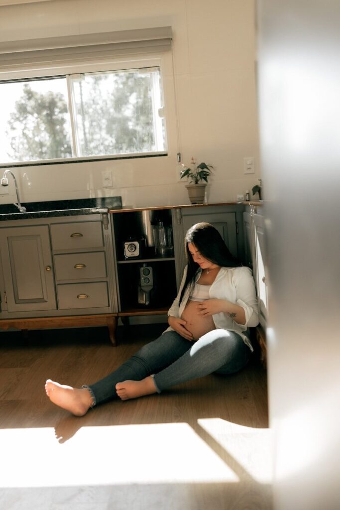 Exhausted mother reading paperwork after learning what to do after autism diagnosis for her child