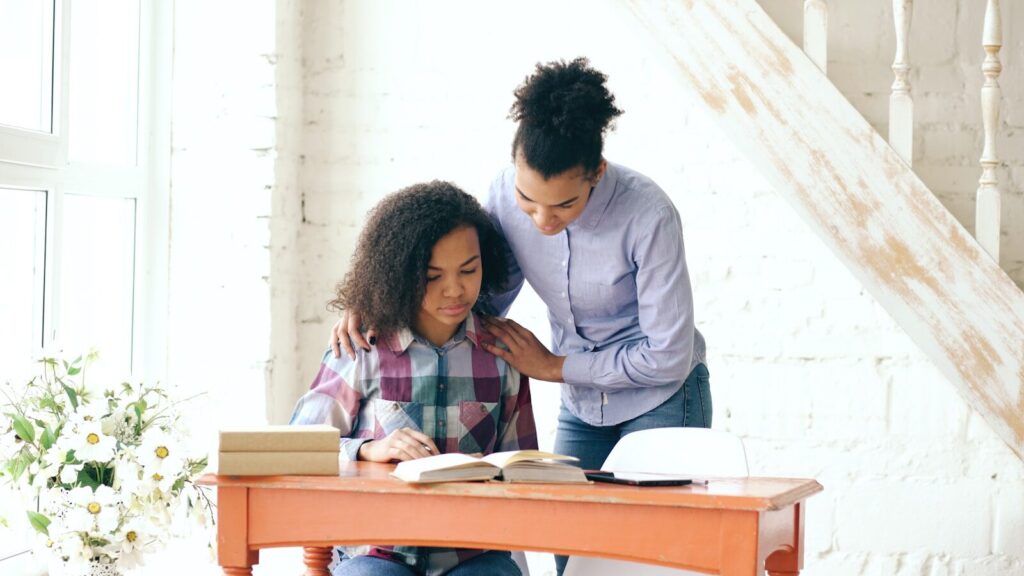 IEP meeting preparation - parent and child at table