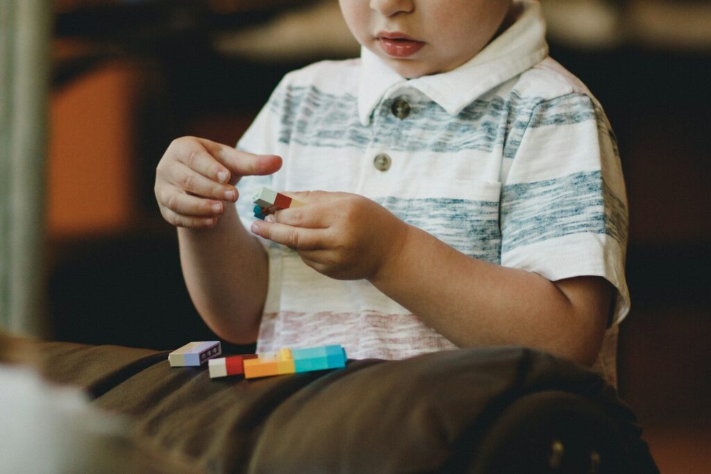 autistic child demonstrating executive function challenges while trying to complete task