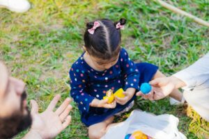 parent introducing sensory tools to autistic child gently without forcing