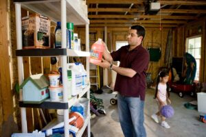 parent and child organizing emergency preparedness supplies for special needs family