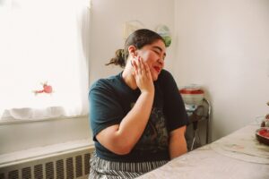 Exhausted special needs mom anger rage sitting alone overwhelmed by caregiver burnout