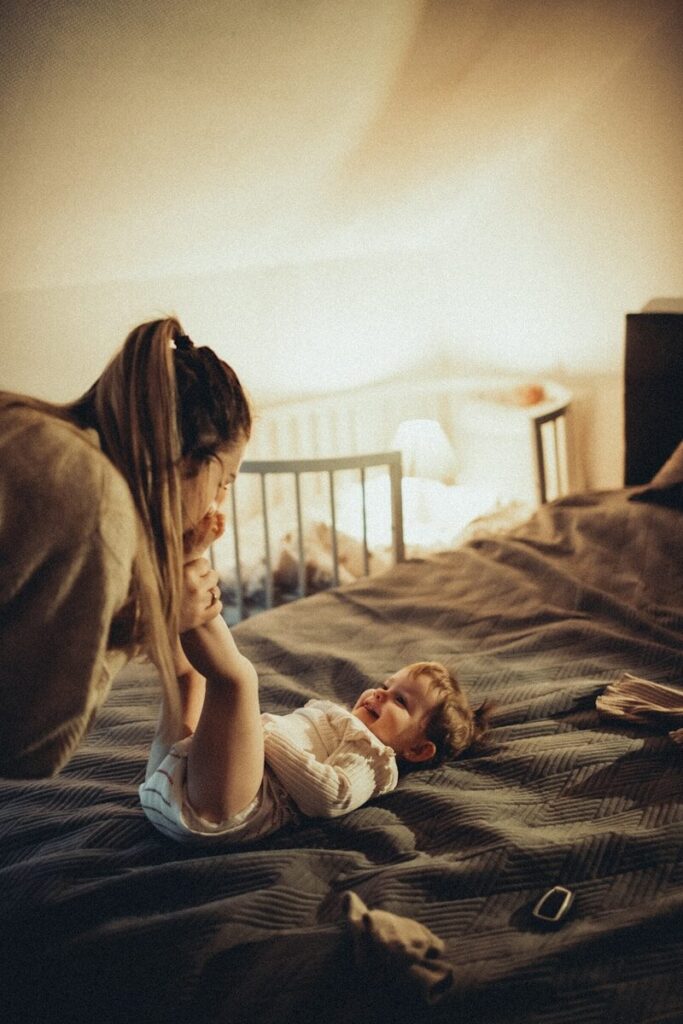 tired mother checking on autistic child at night worried about autism sleep apnea connection signs