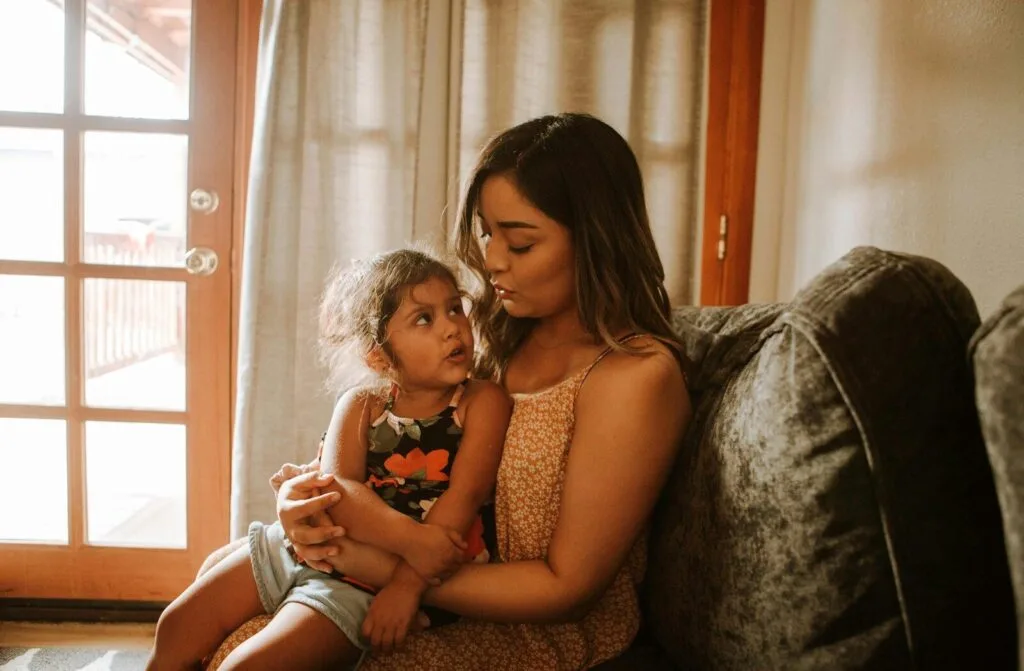 Mother holding child - gestalt language processing autism support