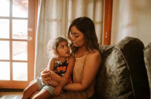 Mother holding child - gestalt language processing autism support
